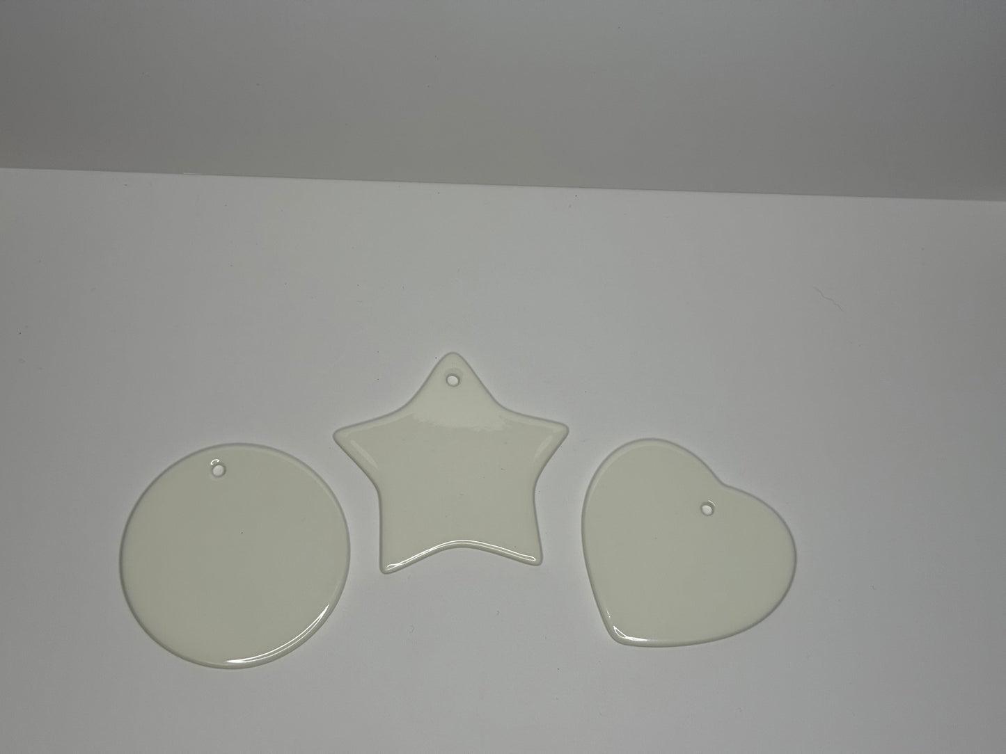 Ceramic disk with any custom design , finished with a luxurious velvet ribbon to hang.