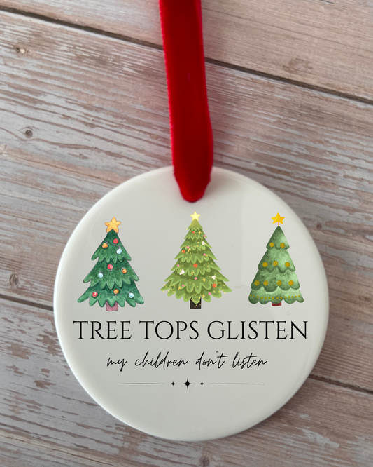 Tree tops glisten , children don’t listen funny hanging decoration
